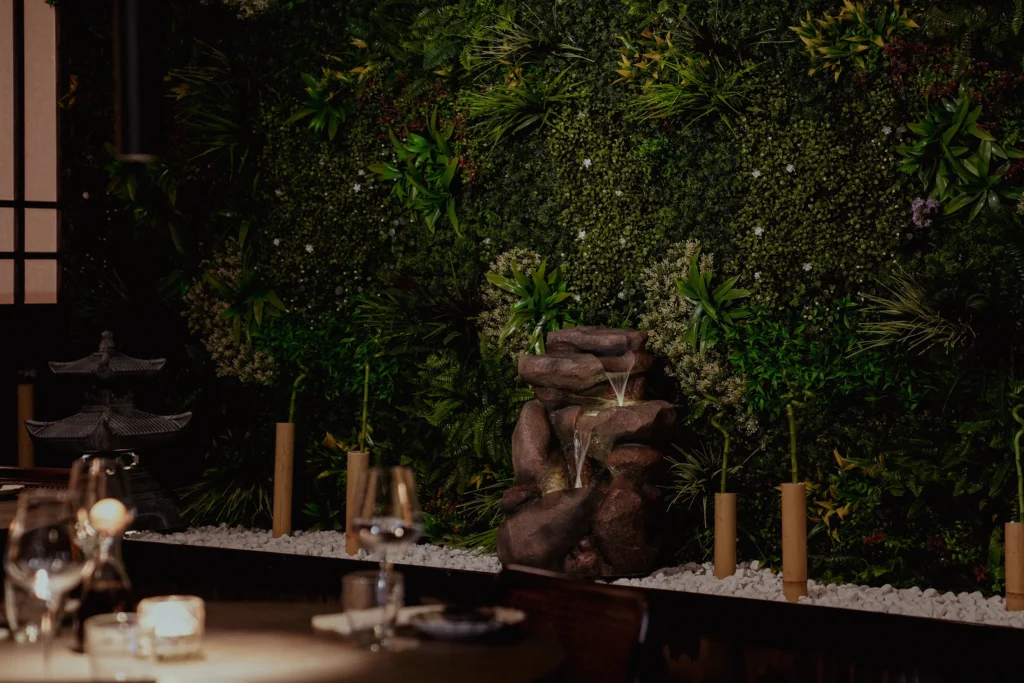 Izakaya by komo Gothenburg garden wall, tables and waterfall near göteborgsoperan